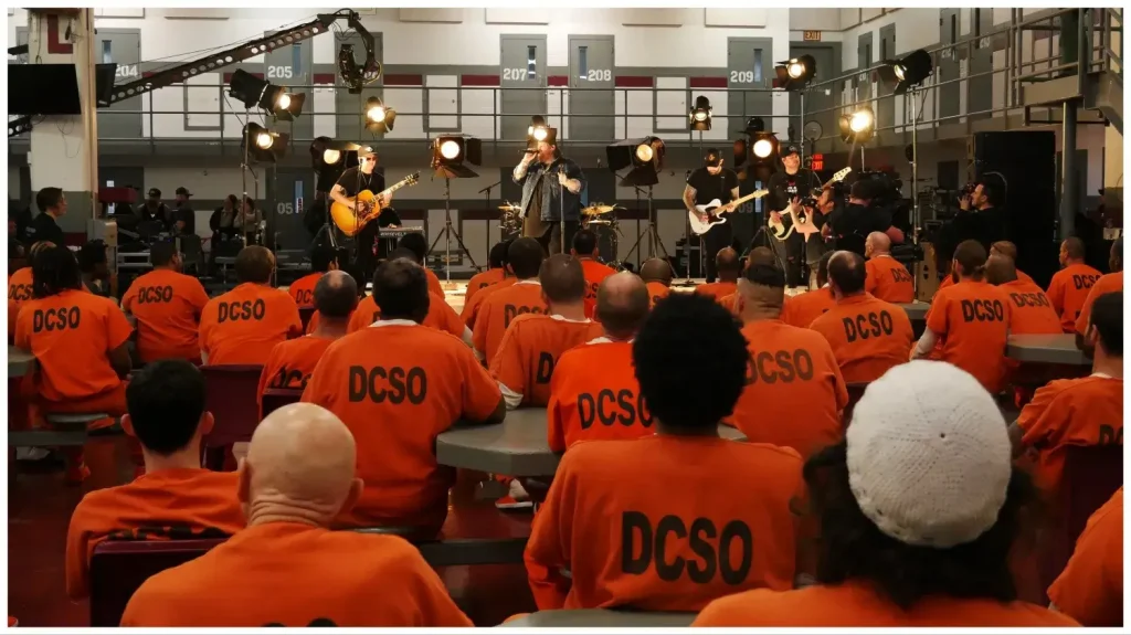 shot of country music documentary Rebel Country, featuring a live performance of Jelly Roll in a prison. Original score composed by Nick Watson for Why Now and BMG